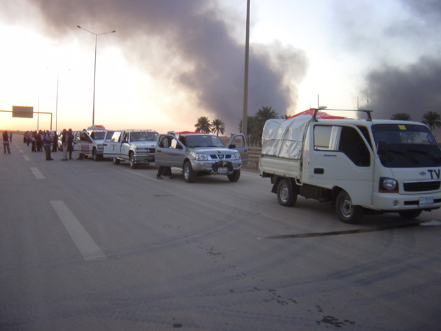 Fires Near Road Block Into Baghdad