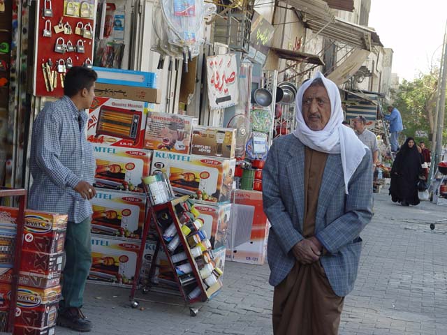 Man Walking Down Karada Street