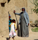 Man Leaning Against The Wall